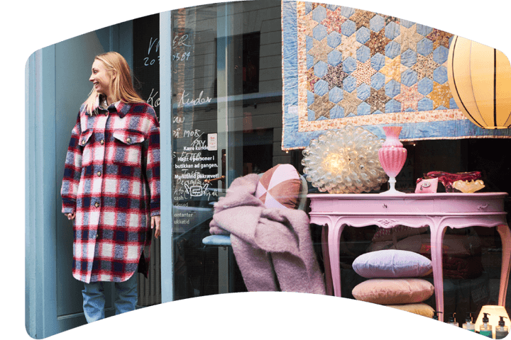 Women standing in the door in a store.